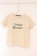 an another angelus / BoutiqueロゴT  ベージュ O-26-04-06-034-CA-TS-IG-OS