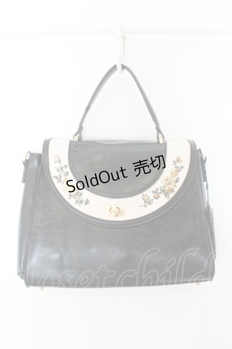 画像1: an another angelus / サークルフラップ刺繍台形バッグ  クロ O-26-07-21-1020-CA-BG-OW-OS (1)