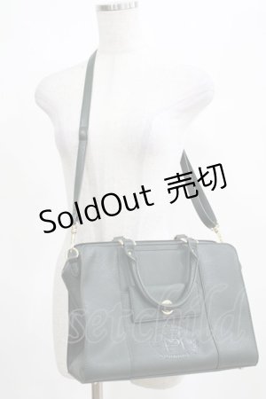 画像: Maison de FLEUR Petite Robe canone / 列車に飛び乗るボストンバッグ  グリーン H-25-03-22-048-EL-BG-NS-ZH